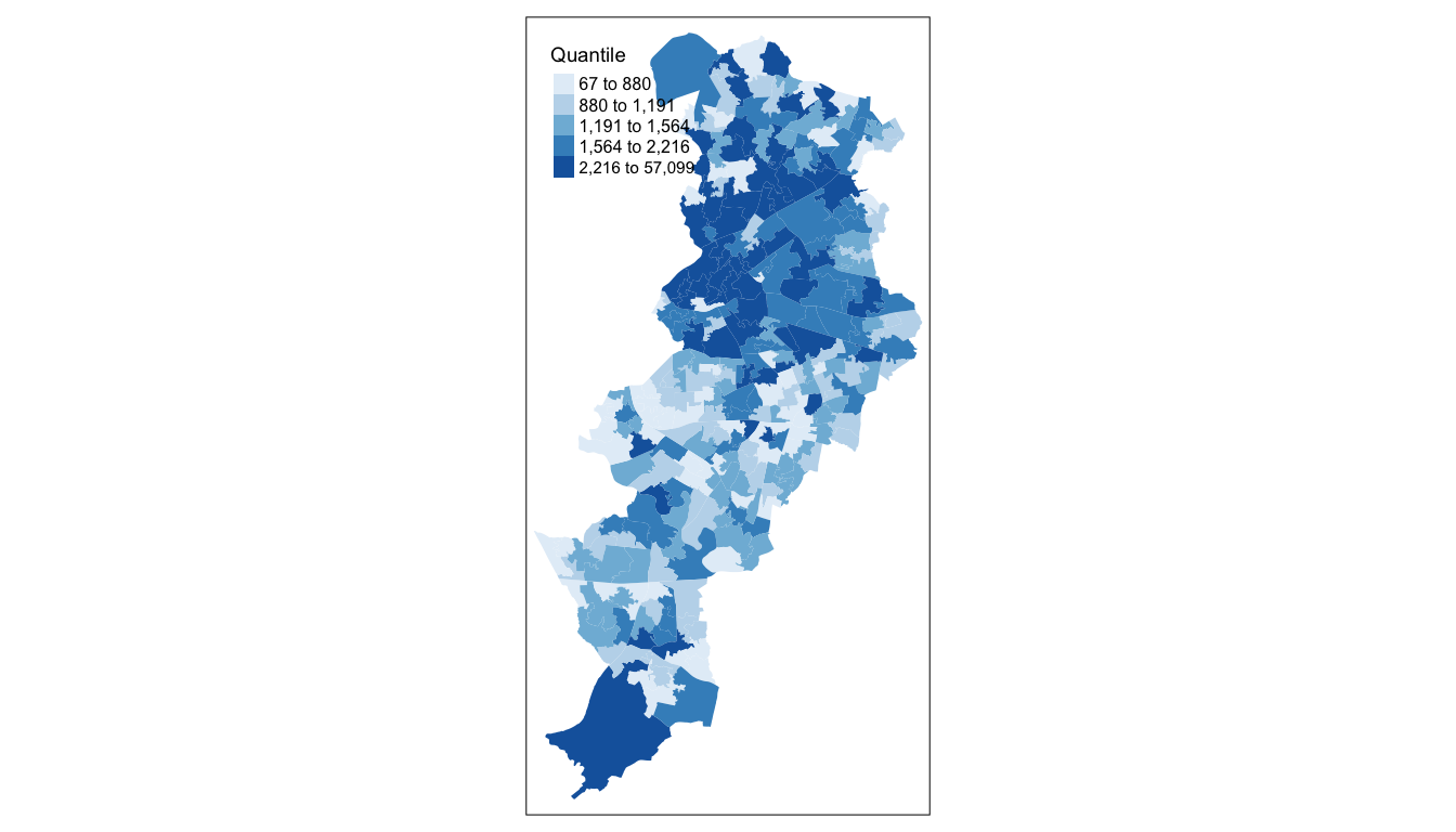 A shaded map of the LSOAs in Manchester, similar to the ones before, using the colourblind friendly blue gradient. The legend in the top left, titled 'Quantile', lists which values correspond to the five colours, according to the Quantile classification; the first four colours correspond to a few values, and the last one to most. Much of the north half of Manchester is shaded in the darker colours. The south half has some dark LSOAs as well, but is generally lighter.